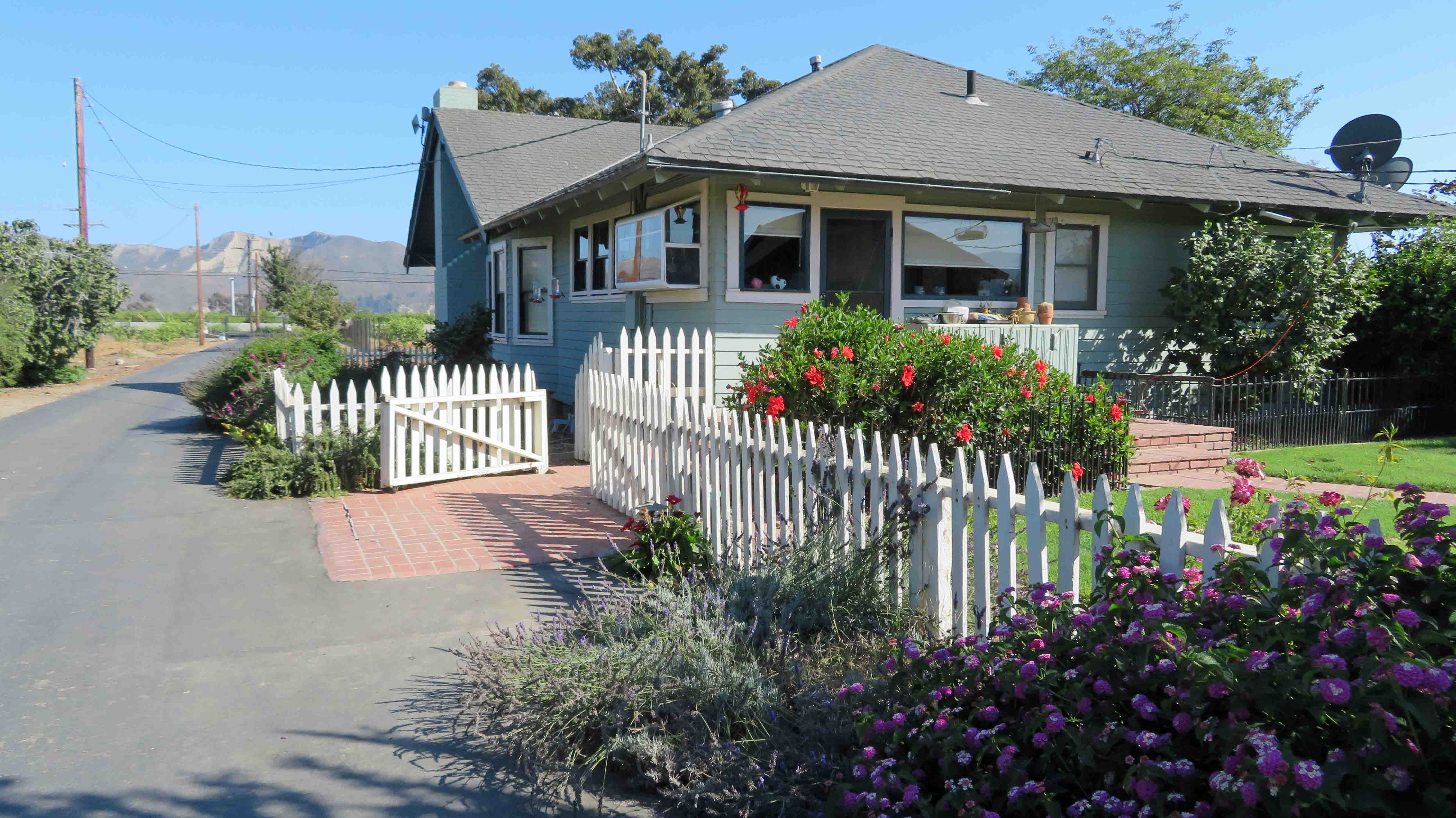 Fig Tree Ranch Farm with '20's house and barn Susan Caughey - Gallery Image