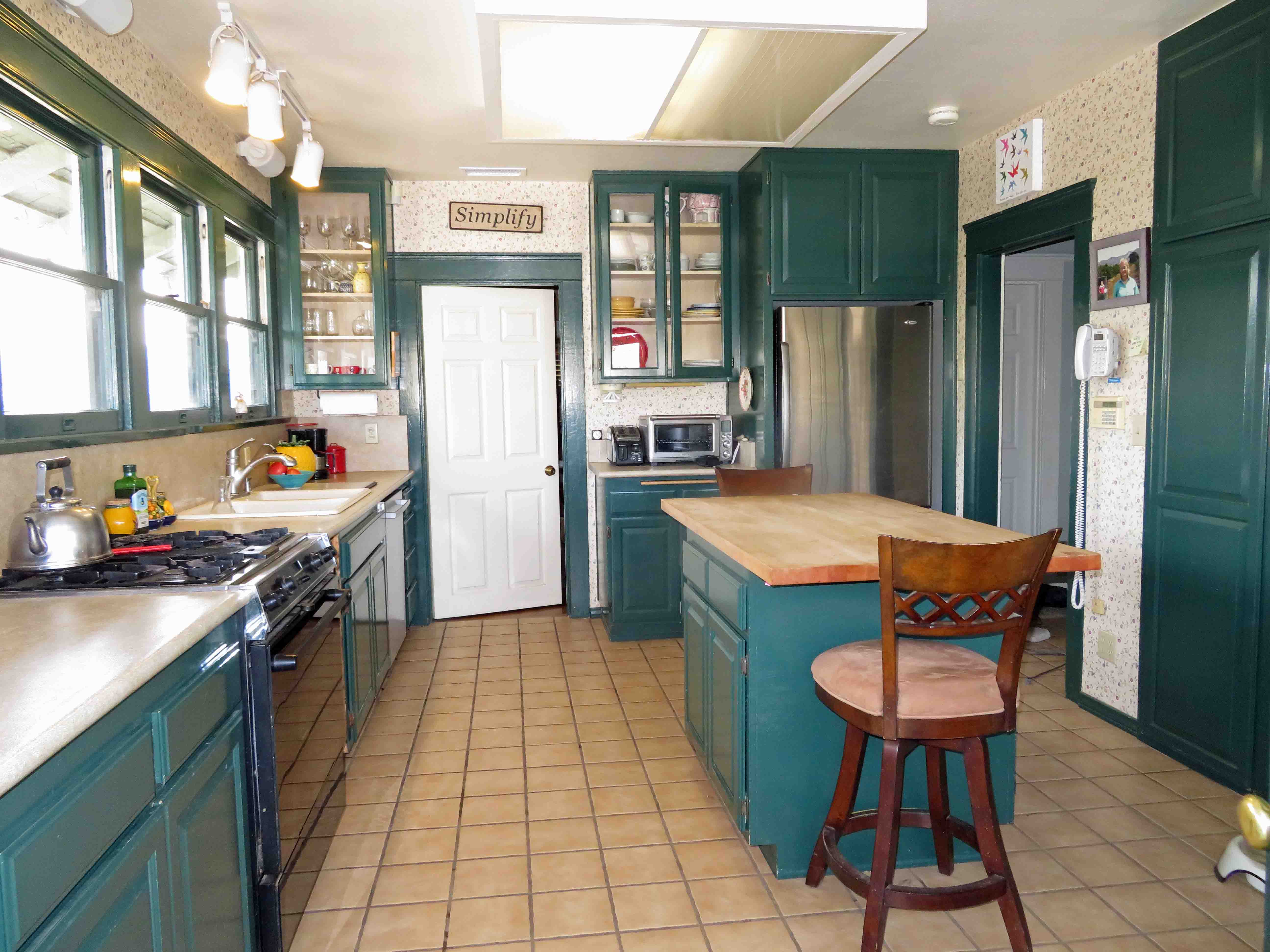 Fig Tree Ranch Farm with '20's house and barn Susan Caughey - Gallery Image